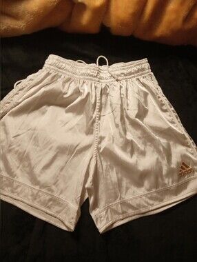 adidas White Shorts with Gold Logo Accent